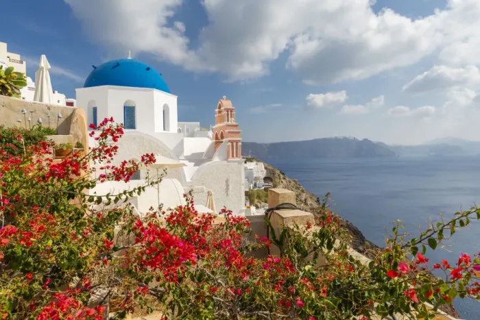 Framed Print : View of blue domed church and sea in Oia village, Santorini, Aegean Island, Cyclades Island Framed Print : View of blue domed church and sea in Oia village, Santorini, Aegean Island, Cyclades Island
