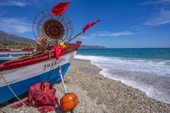 Framed Print : View of boat on Playa de Burriana beach in Nerja, Costa del Sol, Malaga Province, Andalusia, Spain, Mediterranean, Europe Framed Print : View of boat on Playa de Burriana beach in Nerja, Costa del Sol, Malaga Province, Andalusia, Spain, Mediterranean, Europe