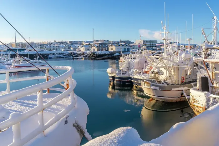 Framed Print : View of boats in Hafnarfjorour Marina and town in background in winter, Hafnarfjorour, Iceland Framed Print : View of boats in Hafnarfjorour Marina and town in background in winter, Hafnarfjorour, Iceland
