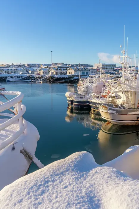 Framed Print : View of boats in Hafnarfjorour Marina and town in background in winter, Hafnarfjorour, Iceland Framed Print : View of boats in Hafnarfjorour Marina and town in background in winter, Hafnarfjorour, Iceland