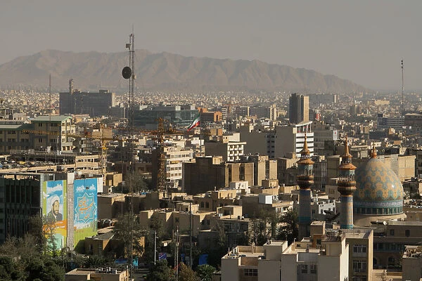 View over buildings from city centre towards Alborz Mountains, Tehran, Iran, Middle East