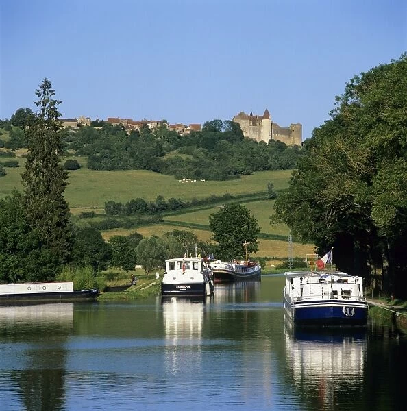 View along the Burgundy Canal to the Chateau, Chateauneuf, Burgundy, France, Europe
