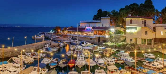 Framed Print : View of cafe and restaurant overlooking boats in harbour at dusk, Lovran village, Lovran, Kvarner Bay, Eastern Istria, Croatia, Europe
