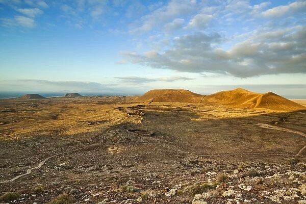 View from Calderon Honda crater of lava rock ruins and volcanic cones of the north, Lajares, Fuerteventura, Canary Islands, Spain, Europe