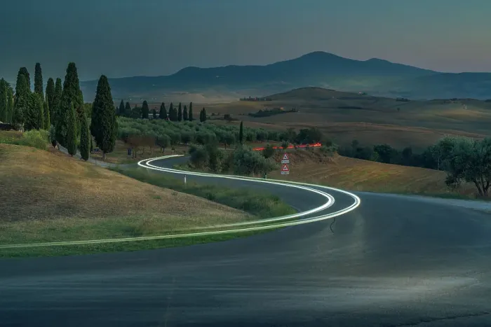 Framed Print : View of car trail lights in Tuscan landscape near Pienza at dusk, Pienza, Province of Siena, Tuscany, Italy, Europe Framed Print : View of car trail lights in Tuscan landscape near Pienza at dusk, Pienza, Province of Siena, Tuscany, Italy, Europe