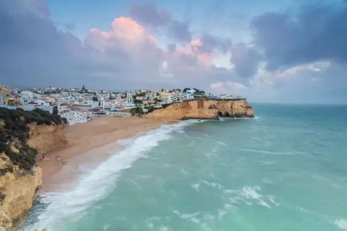 Framed Print : View of Carvoeiro village surrounded by sandy beach and turquoise sea at sunset, Lagoa Municipality Framed Print : View of Carvoeiro village surrounded by sandy beach and turquoise sea at sunset, Lagoa Municipality
