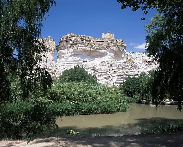 View to castle on top of chalk cliffs on the Jucar River