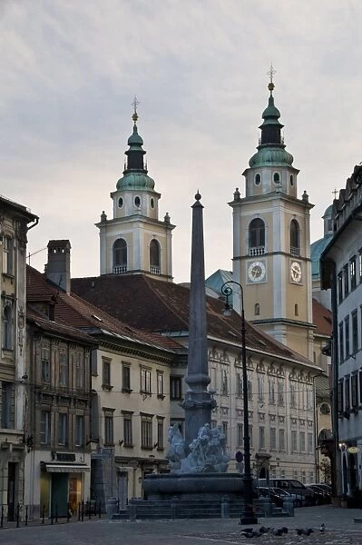 View towards the Cathedral of St. Nicholas along the streets of the old town of Ljubljana