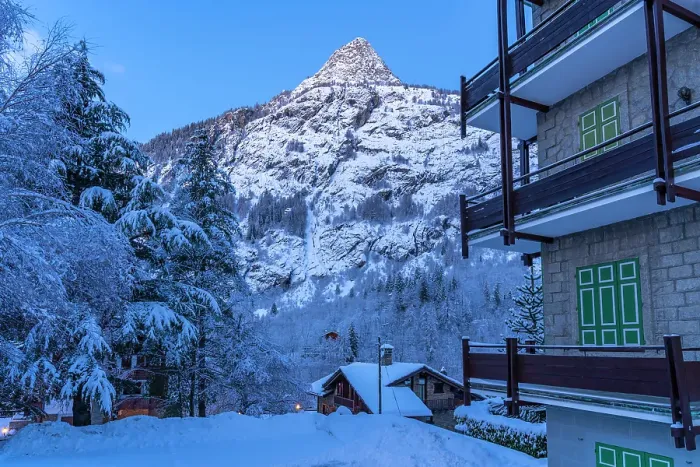 Framed Print : View of chalets and snow covered mountains in Courmayeur before dawn in winter, Courmayeur, Aosta Valley, Italian Alps, Italy Framed Print : View of chalets and snow covered mountains in Courmayeur before dawn in winter, Courmayeur, Aosta Valley, Italian Alps, Italy
