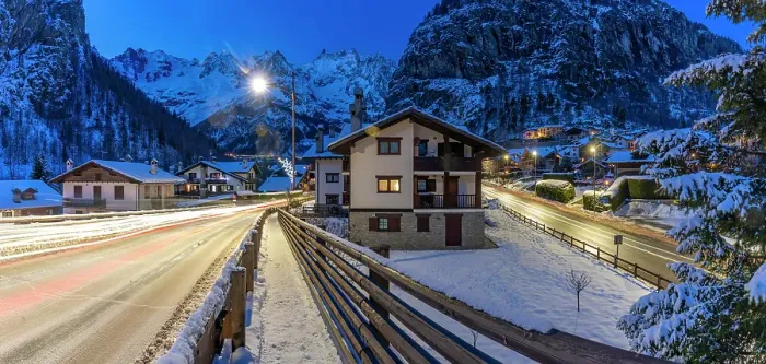 Framed Print : View of chalets and snow covered mountains in Courmayeur at dusk in winter, Courmayeur, Aosta Valley, Italian Alps, Italy