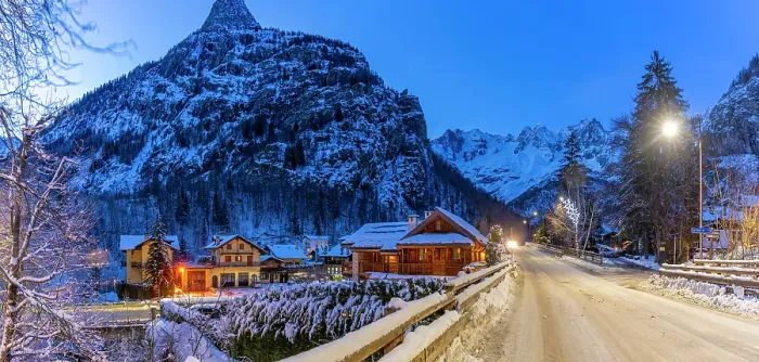 Framed Print : View of chalets and snow covered mountains in Courmayeur at dusk in winter, Courmayeur, Aosta Valley, Italian Alps, Italy