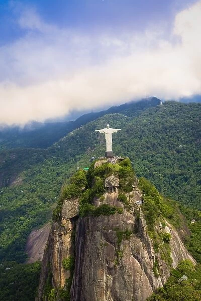 View of the Christ statue (Cristo Redactor) on Corcovado with Tijuca National Park behind