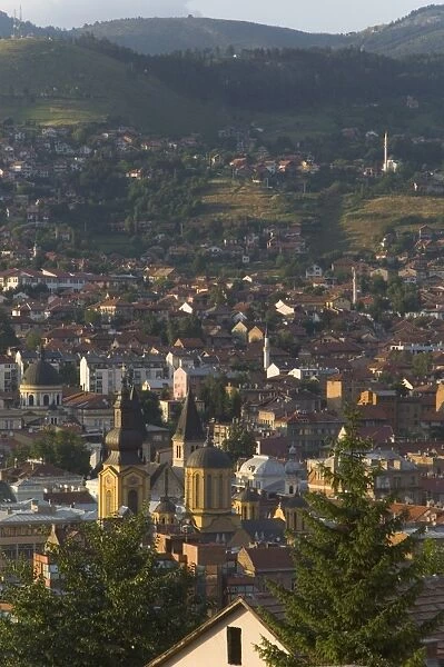 View over city with Orthodox cathedral in foreground, Sarajevo, Bosnia