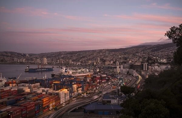 View of city and ports at dusk from Paseo 21 de Mayo, Cerro Playa Ancha, Valparaiso, Central Coast, Chile, South America