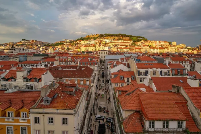 Framed Print : View of city rooftops and Lisbon Castle from Santa Justa Lift during golden hour, Lisbon, Portugal, Europe