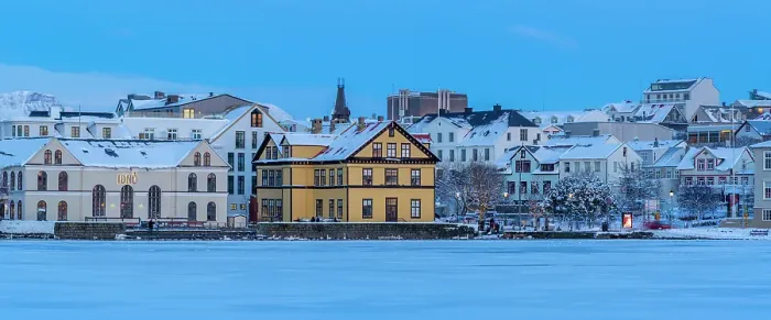 Framed Print : View of the city skyline of Reykjavik from Tjornin lake at sunset in winter, Reykjavik, Iceland