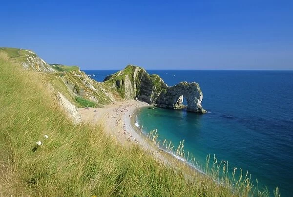 View from coastal path of Durdle Door, arch of Purbeck limestone, near West Lulworth