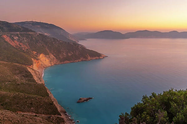 View of coastline, sea and hills near Assos at sunset, Kefalonia, Ionian Islands, Greek Islands, Greece, Europe