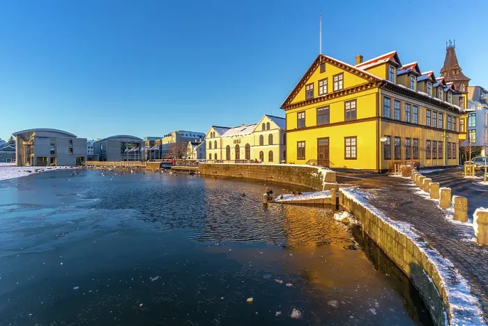 Framed Print : View of colourful buildings and City Hall in background in the city centre of Reykjavik in winter, Reykjavik, Iceland Framed Print : View of colourful buildings and City Hall in background in the city centre of Reykjavik in winter, Reykjavik, Iceland
