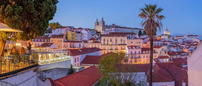 Framed Print : View of colourful buildings and red rooftops at dusk in the Alfama District, Lisbon, Portugal, Europe