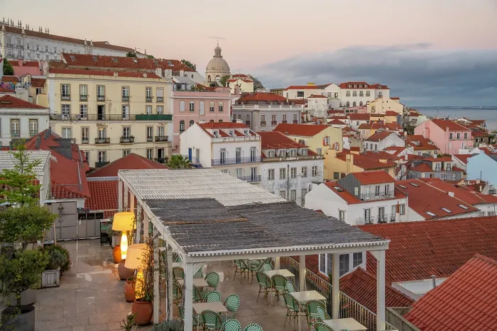 Framed Print : View of colourful buildings and red rooftops at sunset in the Alfama District, Lisbon, Portugal, Europe Framed Print : View of colourful buildings and red rooftops at sunset in the Alfama District, Lisbon, Portugal, Europe