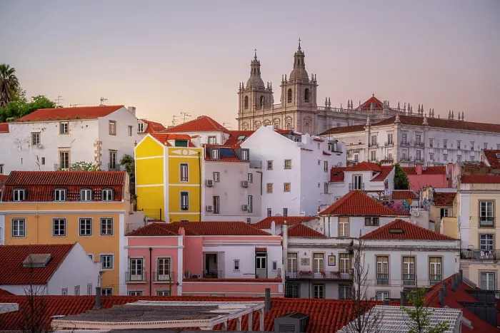 Framed Print : View of colourful buildings and red rooftops at sunset in the Alfama District, Lisbon, Portugal, Europe Framed Print : View of colourful buildings and red rooftops at sunset in the Alfama District, Lisbon, Portugal, Europe