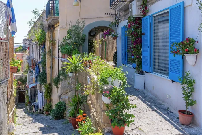 Framed Print : View of colourful narrow street, house with blue shutters and pot plants, Naples, Campania, Italy, Europe Framed Print : View of colourful narrow street, house with blue shutters and pot plants, Naples, Campania, Italy, Europe