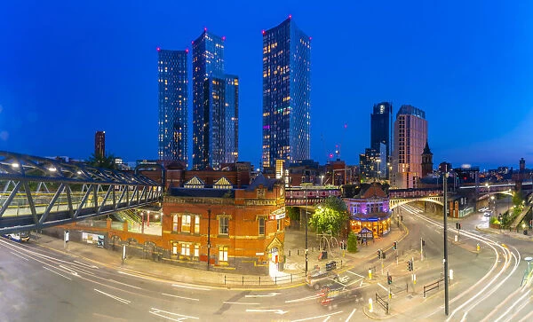 View of Deansgate Station and city skyline at dusk, Manchester, Lancashire, England