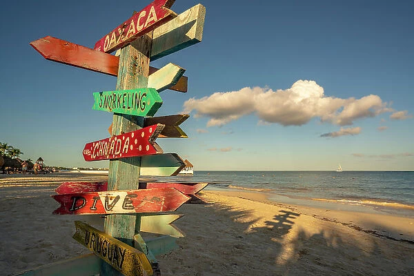 View of destination signpost near Puerto Morelos, Caribbean Coast, Yucatan Peninsula, Mexico, North America