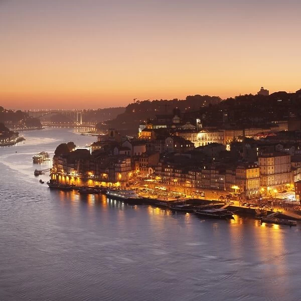 View over Douro River at sunset to Ribeira District, UNESCO World Heritage Site, Porto (Oporto)