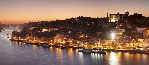 View over Douro River at sunset to Ribeira District, UNESCO World Heritage Site, Porto (Oporto)
