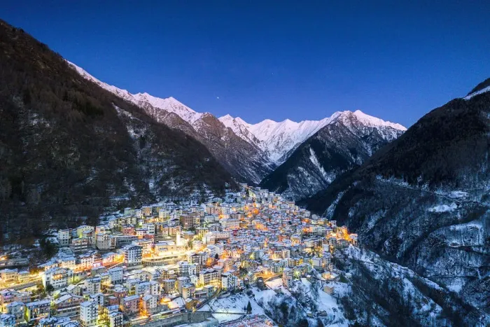 Framed Print : View by drone of winter dusk over the illuminated village of Premana, Valsassina Framed Print : View by drone of winter dusk over the illuminated village of Premana, Valsassina