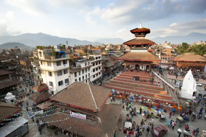 Framed Print : View over Durbar Square from rooftop cafe showing temples and busy streets Framed Print : View over Durbar Square from rooftop cafe showing temples and busy streets