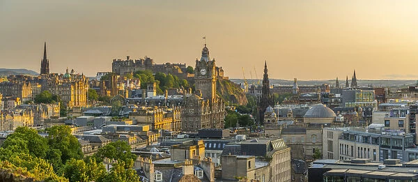 View of Edinburgh Castle, Balmoral Hotel and city skyline from Calton Hill at golden hour