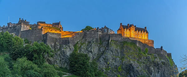 View of Edinburgh Castle from Princes Street at dusk, UNESCO World Heritage Site