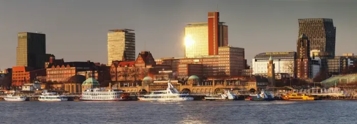 Framed Print : View from Elbe River to St. Pauli Landungsbruecken pier and skyscraper Tanzende Tuerme at sunset