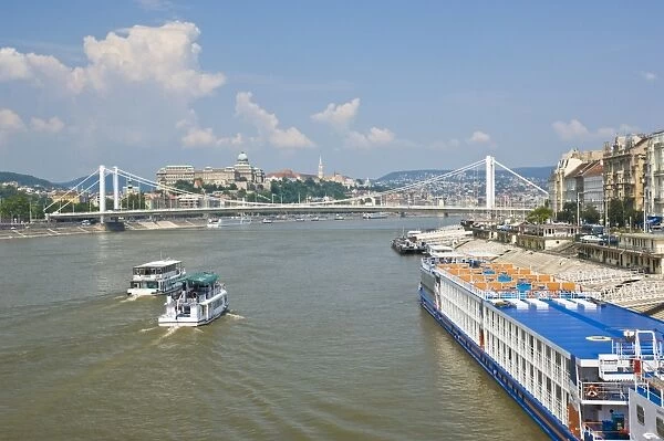 View of Elizabeth Bridge (Erzebet hid), and cruise boats on the River Danube