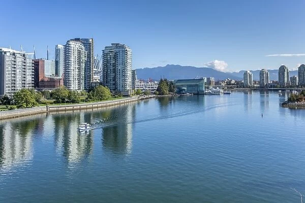 View of False Creek from Cambie Street Bridge and Vancouver skyline, Vancouver, British Columbia