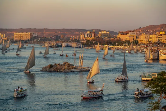 Framed Print : View of fellucas on the Nile river from Feryal Garden during golden hour, Aswan, Nubia, Egypt, North Africa, Africa Framed Print : View of fellucas on the Nile river from Feryal Garden during golden hour, Aswan, Nubia, Egypt, North Africa, Africa