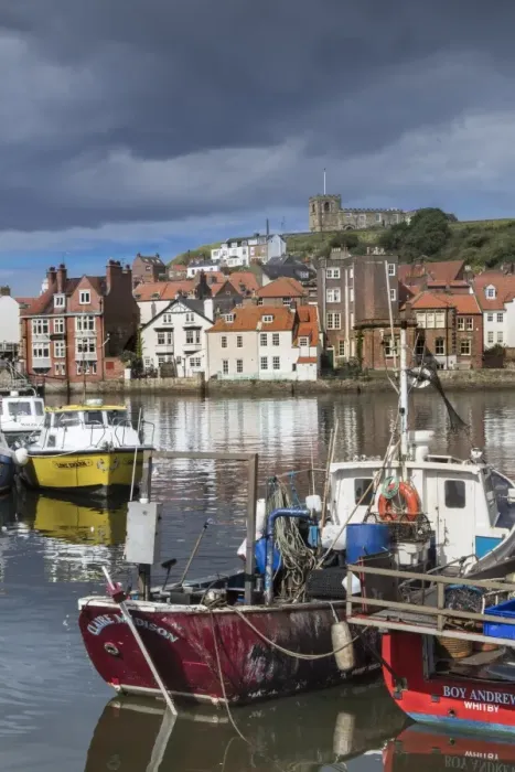 Framed Print : View of fishing boats in the harbour and the town centre, Whitby, Yorkshire, England Framed Print : View of fishing boats in the harbour and the town centre, Whitby, Yorkshire, England