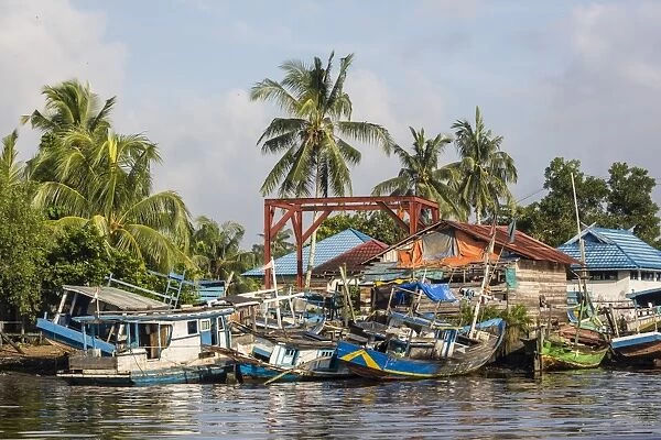 View of fishing boats on the Kumai River, Central Kalimantan province, Borneo, Indonesia