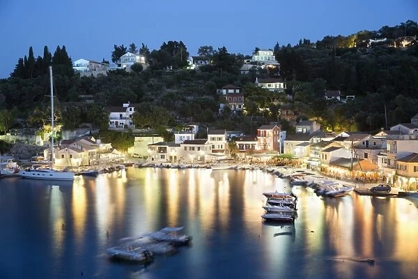 View over harbour at night, Loggos, Paxos, Ionian Islands, Greek Islands, Greece, Europe