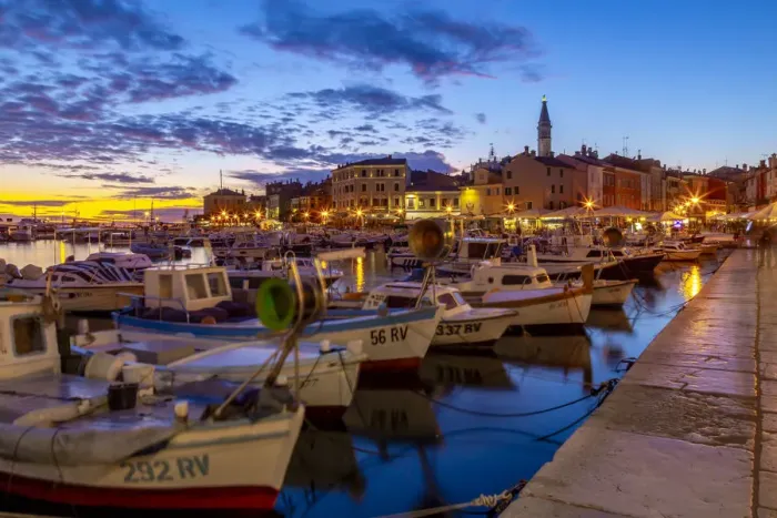 Framed Print : View of harbour and the old town with the Cathedral of St. Euphemia at dusk, Rovinj