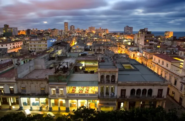 Framed Print : View over Havana Centro at night from 7th floor of Hotel Seville showing contrast of old Framed Print : View over Havana Centro at night from 7th floor of Hotel Seville showing contrast of old