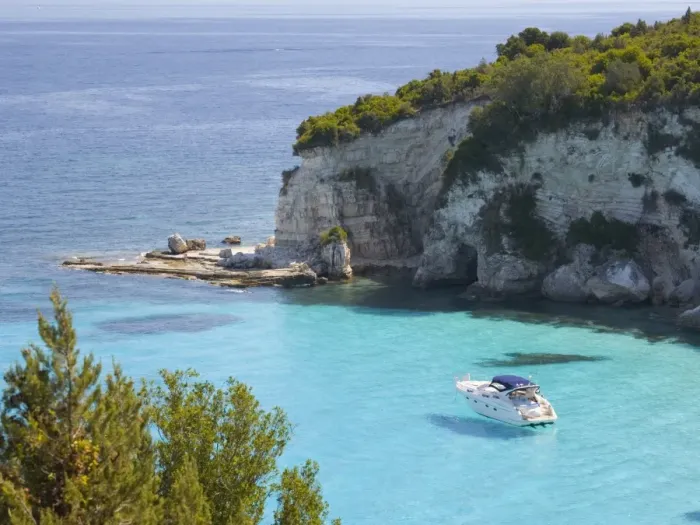 Framed Print : View from hillside over secluded Voutoumi Bay, solitary boat at anchor, Antipaxos, Paxi, Corfu, Ionian Islands, Greek Islands, Greece, Europe Framed Print : View from hillside over secluded Voutoumi Bay, solitary boat at anchor, Antipaxos, Paxi, Corfu, Ionian Islands, Greek Islands, Greece, Europe
