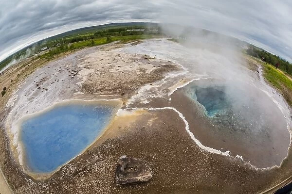 View of hot springs in the Haukadalur valley on the slopes of Laugarfjall hill, Iceland, Polar Regions