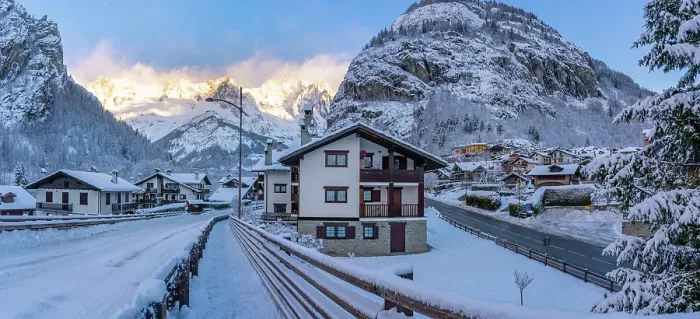 Framed Print : View of hotels, chalets and snow covered mountains in Courmayeur at sunrise in winter, Courmayeur, Aosta Valley, Italian Alps, Italy Framed Print : View of hotels, chalets and snow covered mountains in Courmayeur at sunrise in winter, Courmayeur, Aosta Valley, Italian Alps, Italy
