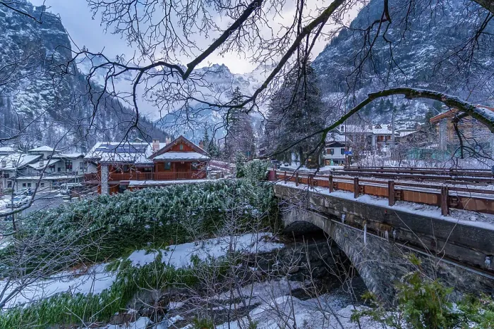 Framed Print : View of hotels and lodges with mountains in background during winter, Courmayeur, Aosta Valley, Italy Framed Print : View of hotels and lodges with mountains in background during winter, Courmayeur, Aosta Valley, Italy
