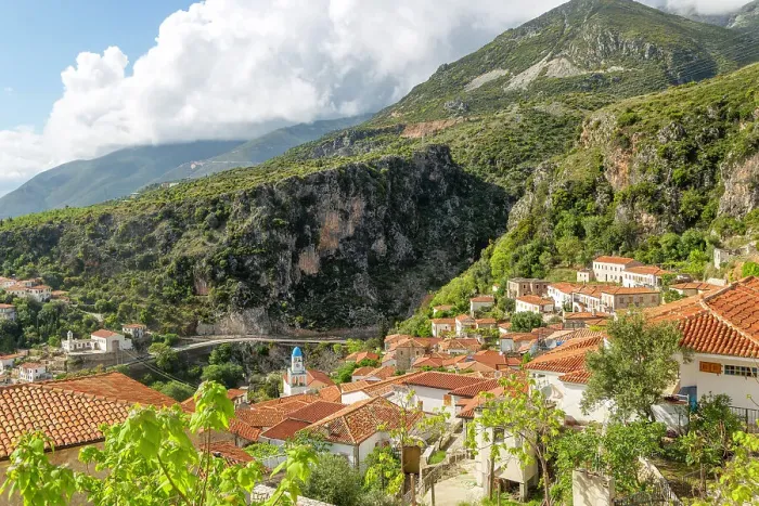 Framed Print : View over houses and rooftops to Greek Orthodox Church of Saint Spyridon, village of Dhermi, Albania, Europe Framed Print : View over houses and rooftops to Greek Orthodox Church of Saint Spyridon, village of Dhermi, Albania, Europe