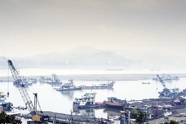 View of industrial boats on the Ayeyarwady River (Irrawaddy) river, Sagaing, Myanmar (Burma)